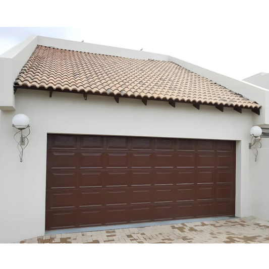 Raised and field steel sectional garage door with classic panel design, heavy duty steel construction, available in multiple colours for single, double and caravan garages.